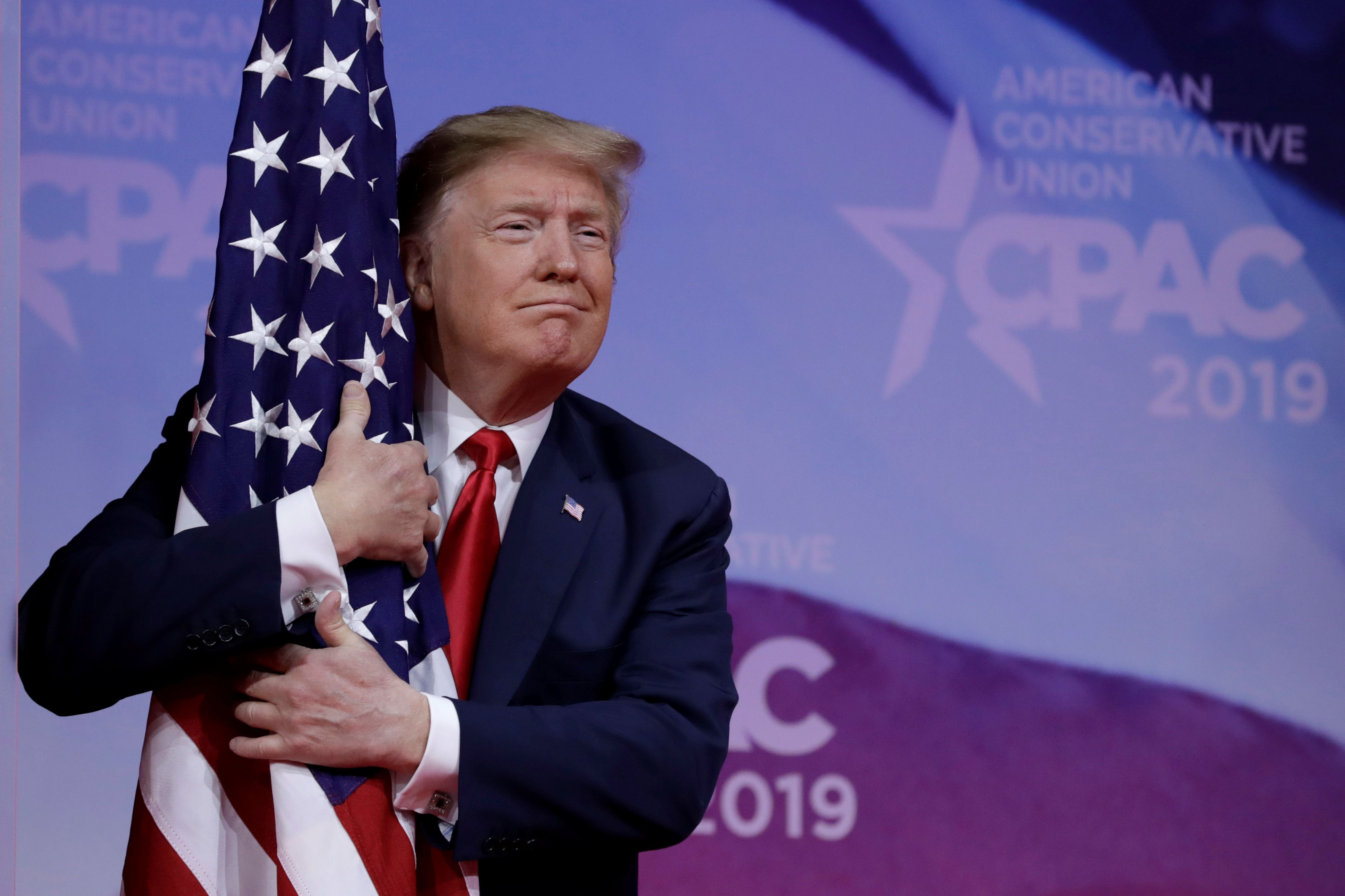 Trump Hugging the American Flag