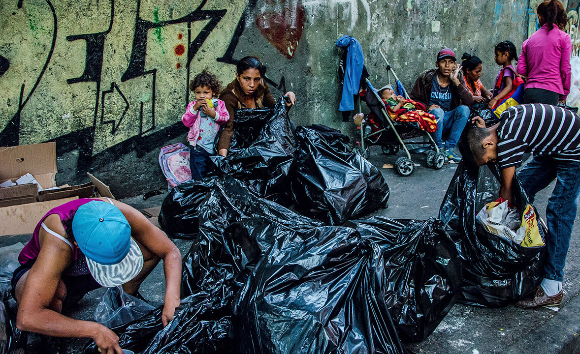 Venezuelans Surrounded by Piles of Trash