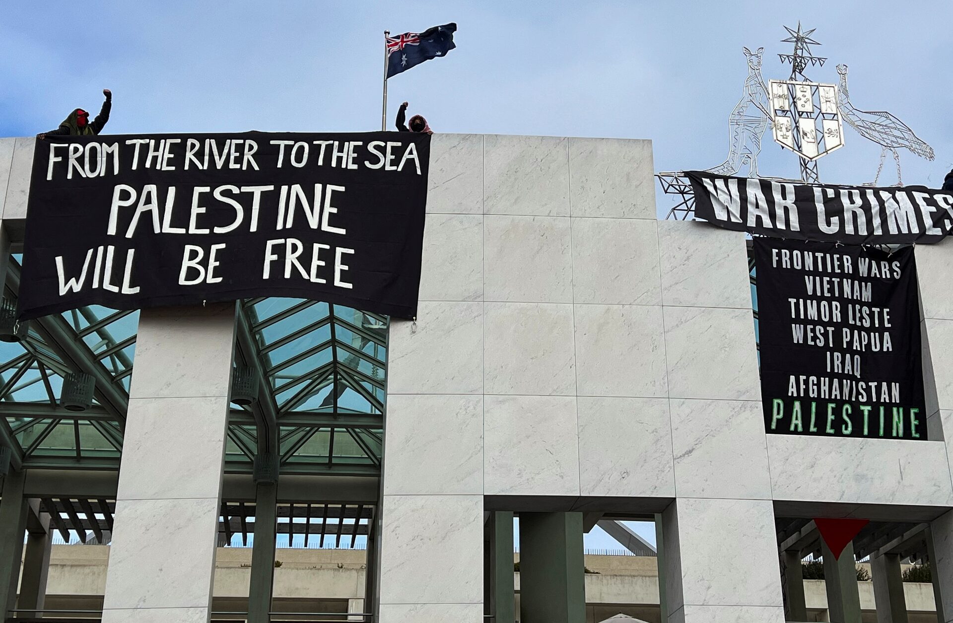 Pro-Palestinian Protesters Hang Banners on Australia's Parliament House